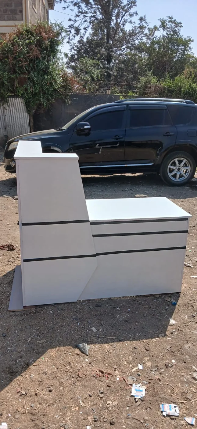 White Reception Desk with Black Stripes